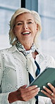 Business, woman and laugh on tablet in office for reading email, financial report and corporate joke. Mature person, digital and research with schedule update, budget planning and investment feedback