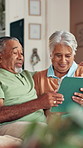 Senior, couple and laughing with tablet in home for funny puzzle game, watching comedy movie and bonding. Retirement, happy people and relax on sofa with digital app for streaming show or comic blog