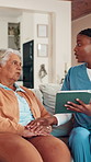 Home, tablet and nurse with senior woman for online help, insurance and health in living room. Sofa, retirement and caregiver with mature person on digital tech for website, results and diagnosis