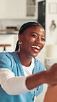 Old person, support and smile with nurse at house for medical, hospice care and kindness. Retirement home, caregiver and discussion with senior patient in living room for healthcare advice and trust