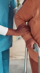 Elderly care, hands or patient with walker, support or help for healthcare or service in nursing home. Retirement, walking or caregiver with closeup, assisted living or senior person with disability