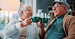 Coffee, bonding and retirement with senior couple on sofa in living room of home together. Cheers, happy or smile with old man and woman drinking caffeine beverage in apartment for relax or romance