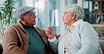 Fighting, upset and senior couple on sofa in living room for divorce, separation or breakup. Argument, conflict and elderly people for marriage crisis, disagreement or communication problem in home.