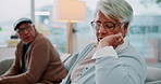 Argument, angry and senior couple on sofa in living room for divorce, separation or breakup. Fighting, conflict and elderly people for marriage crisis, disagreement or communication problem in home.