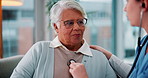 Home, senior woman and nurse with stethoscope, diagnosis and conversation with treatment. Mature person, medical and professional with patient, tool for checkup and heart condition with wellness