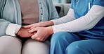 Comfort, empathy and hands of nurse with patient in retirement home for assisted living or support. Consulting, healthcare or medical with caregiver and senior person closeup in apartment for trust