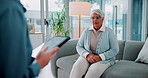 Senior woman, talking and therapist with notes on tablet for counseling for mental health in retirement. Patient, people or psychologist with communication and tech for advice or help in consultation