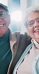 Happy, face and senior couple on sofa in home together for relaxing in living room in morning. Smile, hugging and portrait of elderly man with woman for marriage commitment in lounge at house.