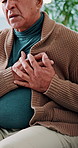 Senior man, hands and heart attack with chest pain, healthcare risk and sick with hypertension. Breathing problem, emergency and person in home with angina, cardiovascular fail and cardiac arrest