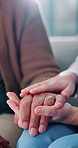 Nurse, senior patient and holding hands for support, elderly care or empathy in closeup of people. Old man, medical worker or person with compassion, trust and kindness in retirement home for healing