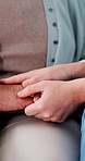 Holding hands, senior patient and nurse for empathy, elderly care or support in closeup of people. Old man, medical worker or person with compassion, trust and kindness in retirement home for news