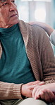 Talking, senior man and holding hands for support, elderly care or empathy with results. Old person, medical news or people with compassion, trust and kindness in retirement home with understanding