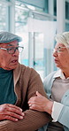 Worry, consulting and news with old couple at hospital for cancer diagnosis, elderly patient and insurance. Healthcare, feedback and medical concern with senior people at clinic for oncology update
