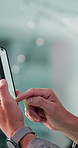 Business, hands and scroll with phone screen in office for investment account, trading app or reading economy news. Bokeh, person and typing on smartphone for financial research and stocks analysis