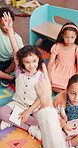 Happy child, teacher and hands raised with question for interaction, answer or response in classroom. Student, kid or learner with smile or pick for education, fun learning or childhood development