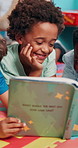 Happy, friends or boy reading book in library for help, development or learning growth in school. Language, creative or male children with smile or story for literature lesson, fairy tale or fantasy