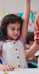 Girl, student or hands raised with question or teacher for help, assistance or interaction in classroom. Child, kid or learner asking with educator or answer for assignment, assessment or school work