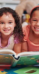 Happy kids, face or girls with book in library for support, development or learning growth in school. Portrait, friends or children with smile or story for literature lesson, fairy tale or fantasy