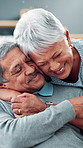 Hug, home and old couple with love, smile and bonding together with trust, relationship and break. Happy people, mature woman and senior man on sofa, embrace and marriage with care, relax and support