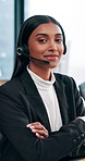 Face, call center and woman in office, arms crossed and telemarketing with help desk, crm or friendly service. Person, employee or agent with headset, pride or confidence with customer support or faq
