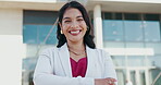 Portrait, business and woman with smile in city for real estate, about us and urban development. Female person, arms crossed and ambition of corporate career, infrastructure and expansion opportunity