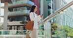 Business, woman and typing with phone by office building for client feedback, real estate advice and networking. Realtor, agent and happy employee with smartphone on balcony for auction listing info