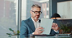 Tablet, laptop and mature businessman in office for research, trading and financial results online. Technology, reading and serious manager check stock price for investment, economy news and profit
