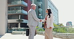 Outdoor, handshake and business people with partnership, recruitment and b2b deal with welcome. Employees, human resources management or candidate with greeting, shaking hands and hello in New York
