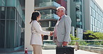 Outdoor, handshake and business people with partnership, greeting or b2b deal with recruitment. Employees, human resources management or candidate with welcome, shaking hands or onboarding with hello