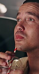 Movie, drink and man in cinema audience for premiere and entertainment. Theatre, person drinking and suspense or shock of show, performance and watching film with beverage cup, spectator and straw