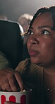 Eating popcorn, movie and woman in cinema audience for premiere and entertainment. Theatre, people and suspense or closeup for show, performance and watching film with snack, spectator and fun