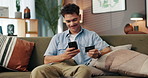 Happy man, phone and sofa with credit card for payment, online shopping or ecommerce at home. Male person, shopper or debit with smile on mobile smartphone for banking app or remote purchase at house