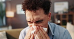 Sick man, sneeze and blowing nose with tissue for illness, influenza or viral infection at home. Male person, bacteria or germs with hayfever, sinus or allergies for cold, flu or disease at house