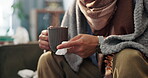 Sick, hands and tissue with tea on sofa for flu recovery, ginger treatment and healing. Closeup, person or blanket with honey drink for influenza virus, health benefits and remedy for illness in home