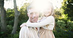Happy, backyard and face of dad with child for bonding, relationship and relax in morning. Family, sunlight and portrait of father carry daughter in garden for fun, love and support on weekend