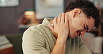 Frustrated man, neck pain and injury with stress for burnout, fatigue or overwored at home. Male person, sore ache or joint inflammation for bad posture, fibromyalgia or muscle tension at house