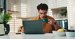 Kitchen, man and tea with laptop for remote work, research information and news story for agency. Home, freelancer and content writer with digital for blog website, online article and blowing coffee