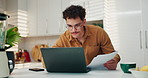Man, laptop and kitchen with documents for finance, expenses or mortgage payments at home. Male person, freelancer or remote worker with computer or paperwork for bills, invoices or house insurance
