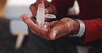 Senior, hands or pill container in home for prescription medication, daily routine or health management. Healthcare, old man or tablets dosage for wellness supplements, arthritis or medical treatment