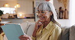 Tablet, smile and glasses with old woman on sofa for streaming, communication app or retirement. Subscription, contact and chat with senior person in living room at home for reading, search and relax