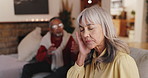 Senior couple, fight or ignore with argument for disagreement, conflict or confrontation at home. Elderly woman, man or stress with confession or accusation for affair or living room dispute at house
