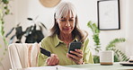 Credit card, phone and mature woman in home for online shopping, internet payment and purchase. Ecommerce, transaction and happy person on smartphone with info for insurance, savings and banking app