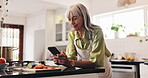 Cooking, phone and reading with old woman in kitchen for food blog recipe, nutrition tracking and health app. Meal prep, dinner planning and retirement with senior person at home for vegetables