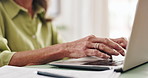Office, hands and mature person with laptop, editor and review of draft for article, typing and web. Media, writer and employee with tech for journalism, online and planning for project in business