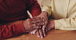 Old couple, holding hands and support with empathy in home for loss, healing or comfort in retirement. Above, elderly people or trust with compassion, sympathy and bonding with care, recovery or love