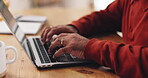 Hands, typing and elderly person with laptop, retirement and review of insurance policy on website. Financial plan, online and browsing of info for medical aid, home and pensioner with tech for funds