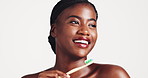 Dental health, happy and black woman brushing teeth in studio for morning routine with hygiene. Oral care, wellness and African female person with toothbrush for fresh breath by white background.