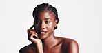 Happy, black woman or face with skincare or beauty for makeup glow up or shine on a white studio background. Portrait, female person or model with smile for cosmetology or dermatology on mockup space