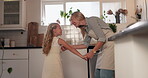 Dance, kitchen or love with mother and daughter in home together for bonding or having fun. Energy, family and smile of single parent woman with girl child in apartment for laughing or wellness