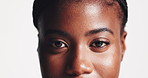 Eyes, skincare and face of black woman in studio for wellness, cosmetics and facial treatment. Dermatology, spa and portrait of person with makeup for aesthetic, salon and glow on white background
